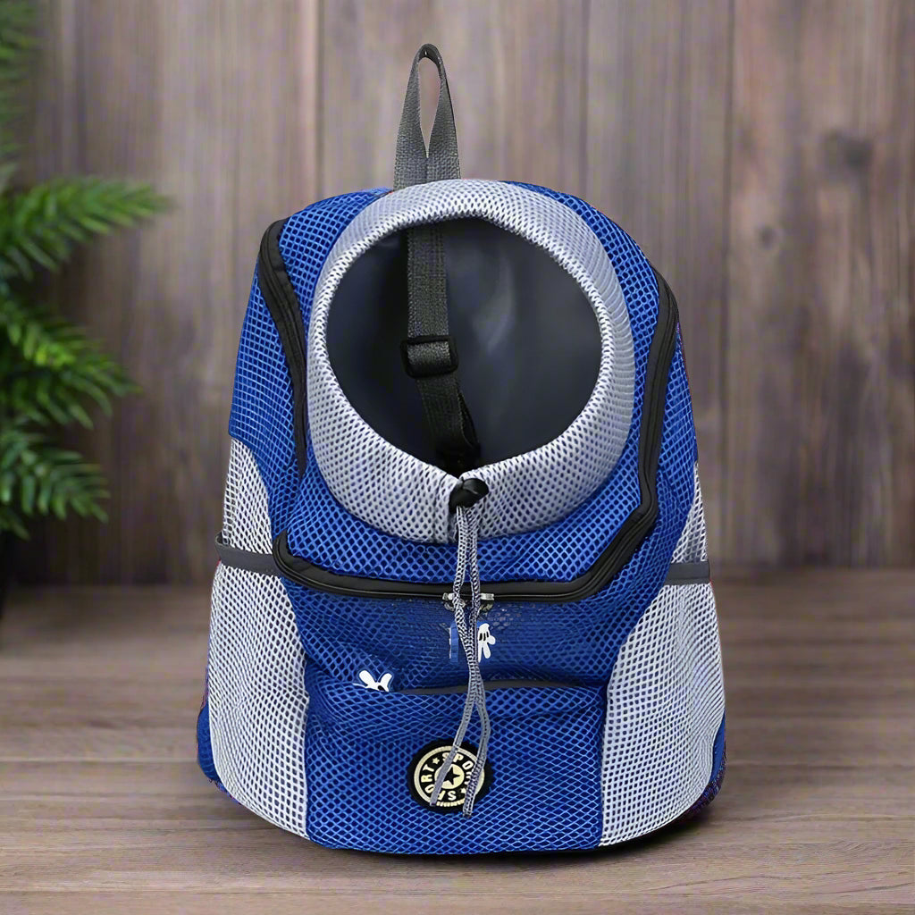 Blue and gray pet carrier backpack on a white background