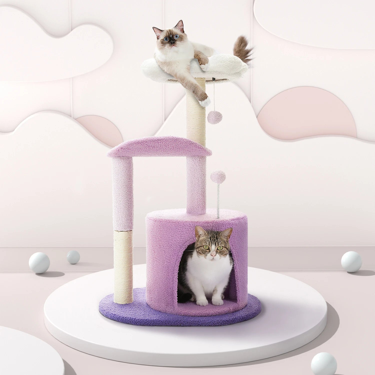 Cat tree with two cats on a white background