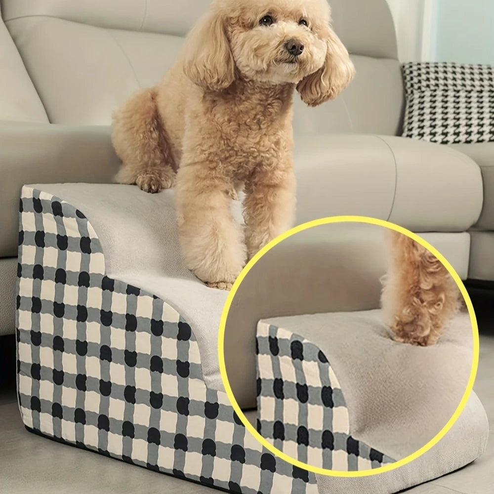 Dog standing on a checkered pet ramp in a living room setting