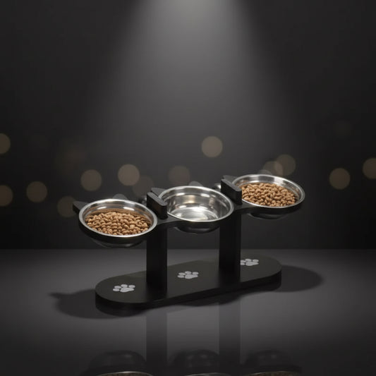 Pet feeding station with three bowls on a gray floor.