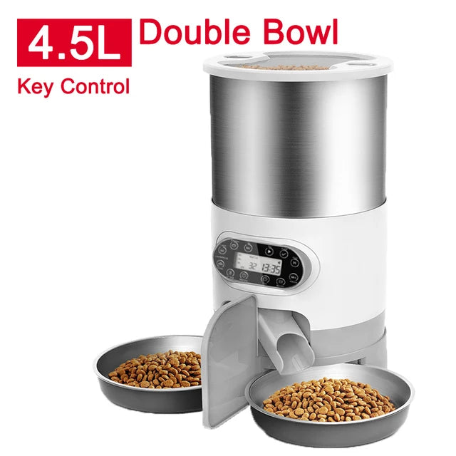 Automatic pet feeder with two bowls of kibble on a white background
