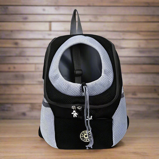 Pet carrier backpack with black and gray design on a white background