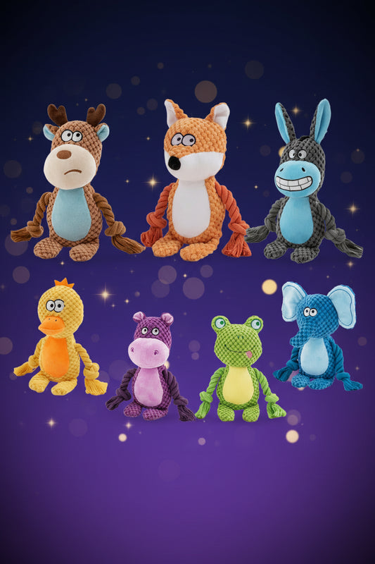 Set of colorful animal plush toys on a white background