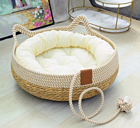 PawNest woven rope cat basket bed with cream cotton cushion and knotted rope toy