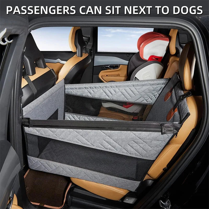 Car interior with a pet barrier installed, allowing passengers to sit next to dogs.