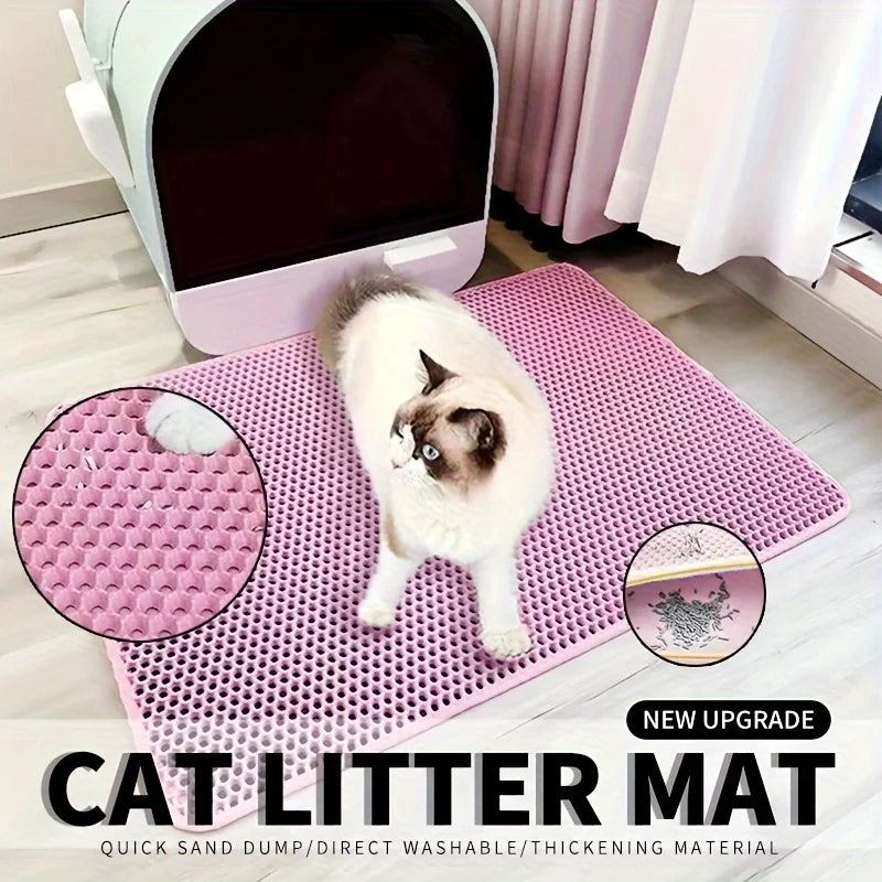 Cat sitting on a pink cat litter mat with a close-up inset, placed in front of a litter box.