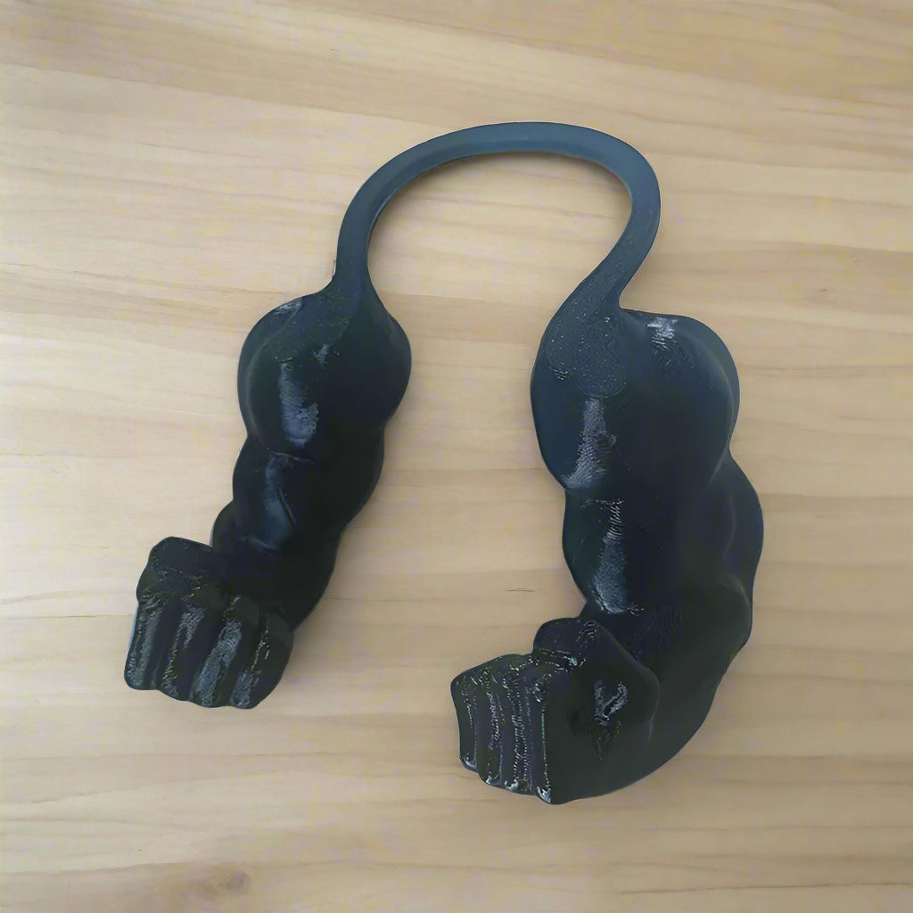 Black cat toy muscle arms resembling panthers