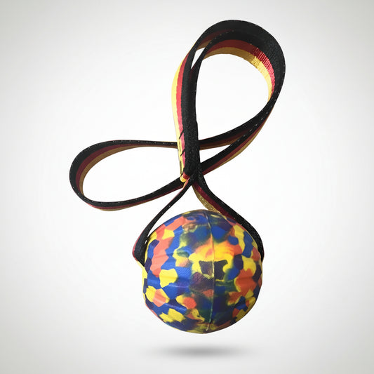 IndestructiFetch™ rubber ball showing hollow treat-fillable core — top view