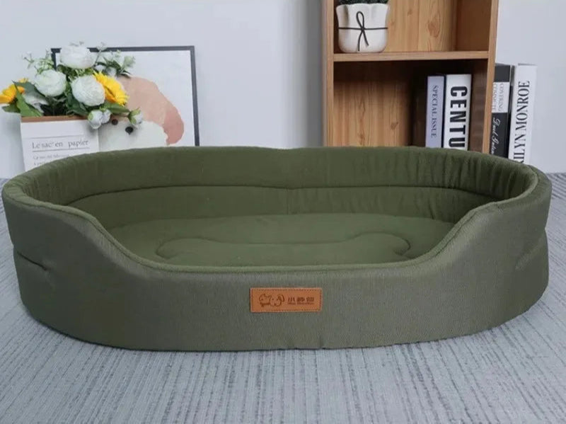 Green pet bed with sponge filling feature on a neutral background