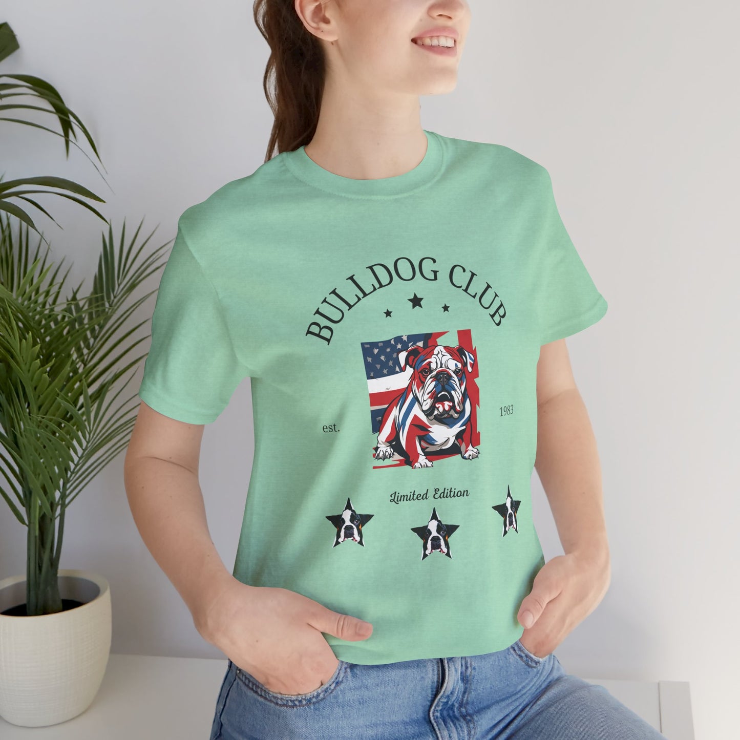Woman wearing Heather Mint Bulldog Club t-shirt with American flag bulldog design