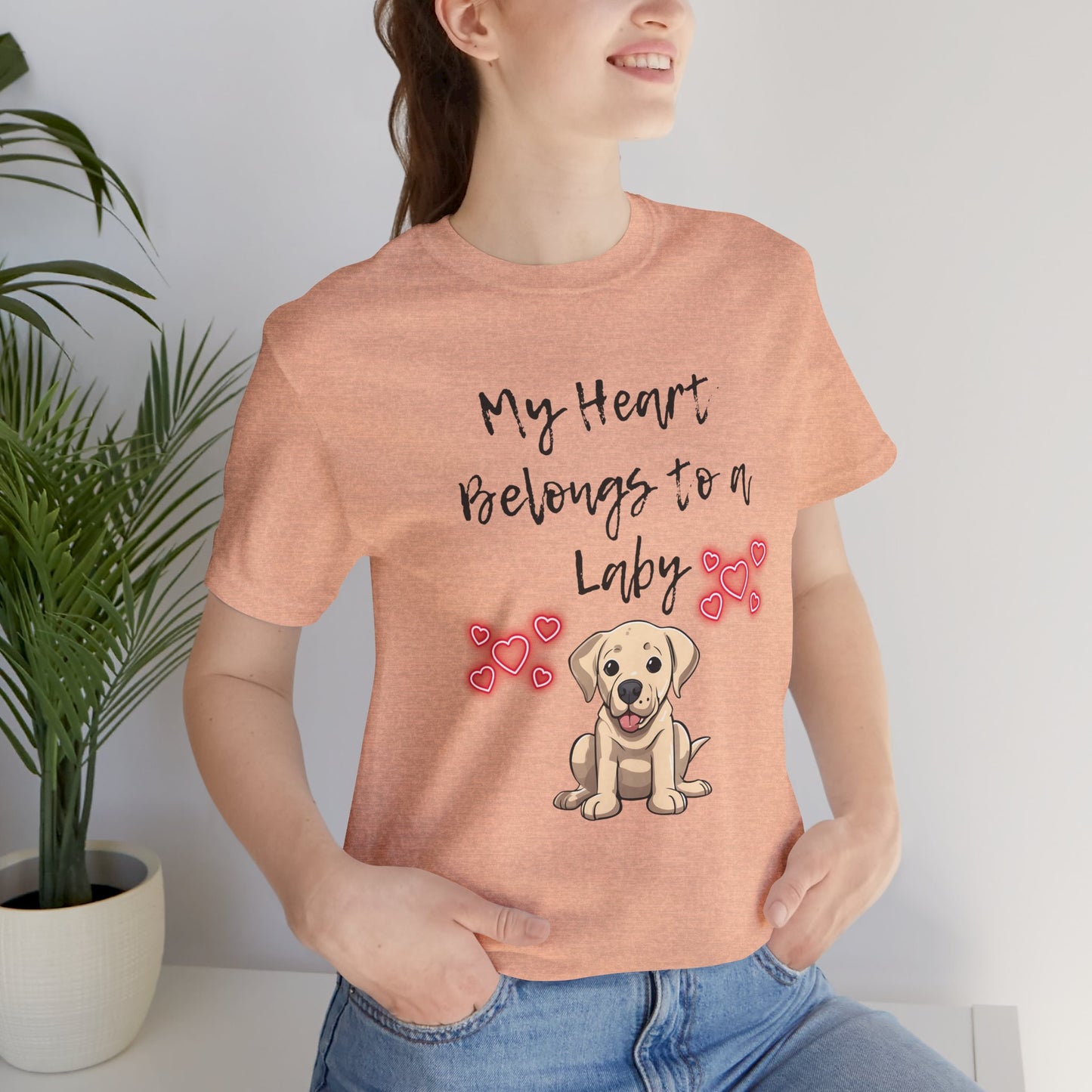 My Heart Belongs to a Laby Labrador t-shirt in Heather Peach worn by a model, front view