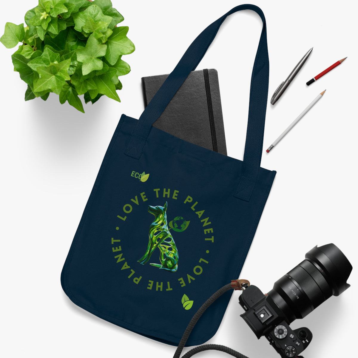 Organic cotton dog design tote bag shown in use as a reusable shopping bag