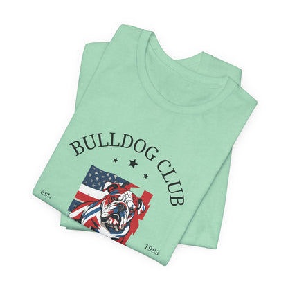 Folded Heather Mint Bulldog Club t-shirt with flag bulldog crest design