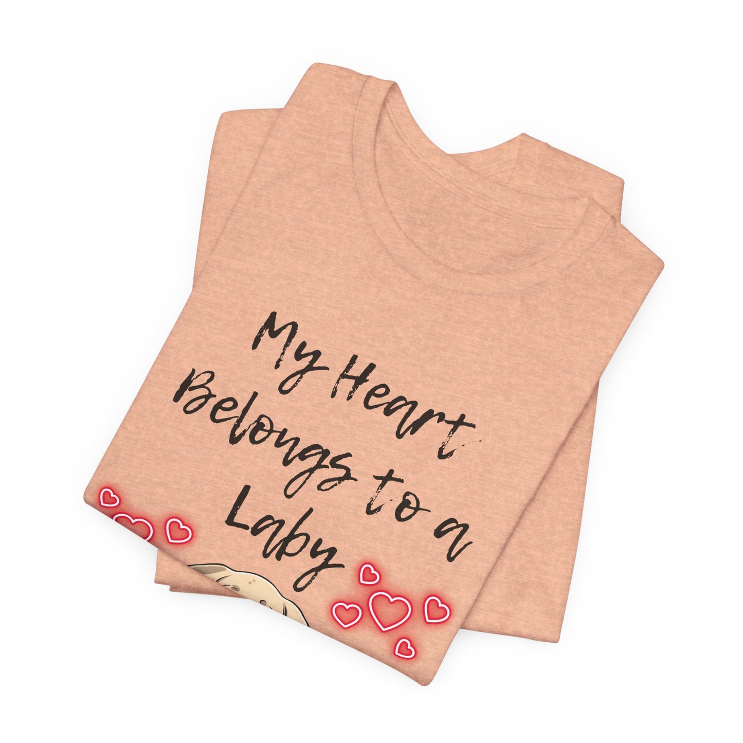 My Heart Belongs to a Laby Labrador t-shirt in Heather Peach, folded view showing Lab puppy and hearts print