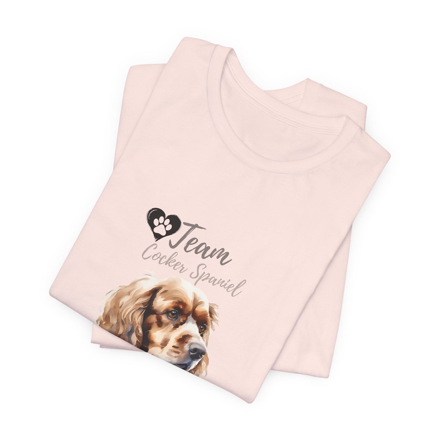 Team Cocker Spaniel watercolour t-shirt in Soft Pink, folded view showing print