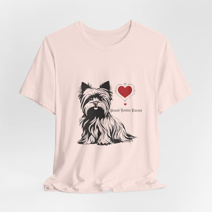 Soft Pink Proud Yorkie Parent graphic tee laid flat showing Yorkshire Terrier print