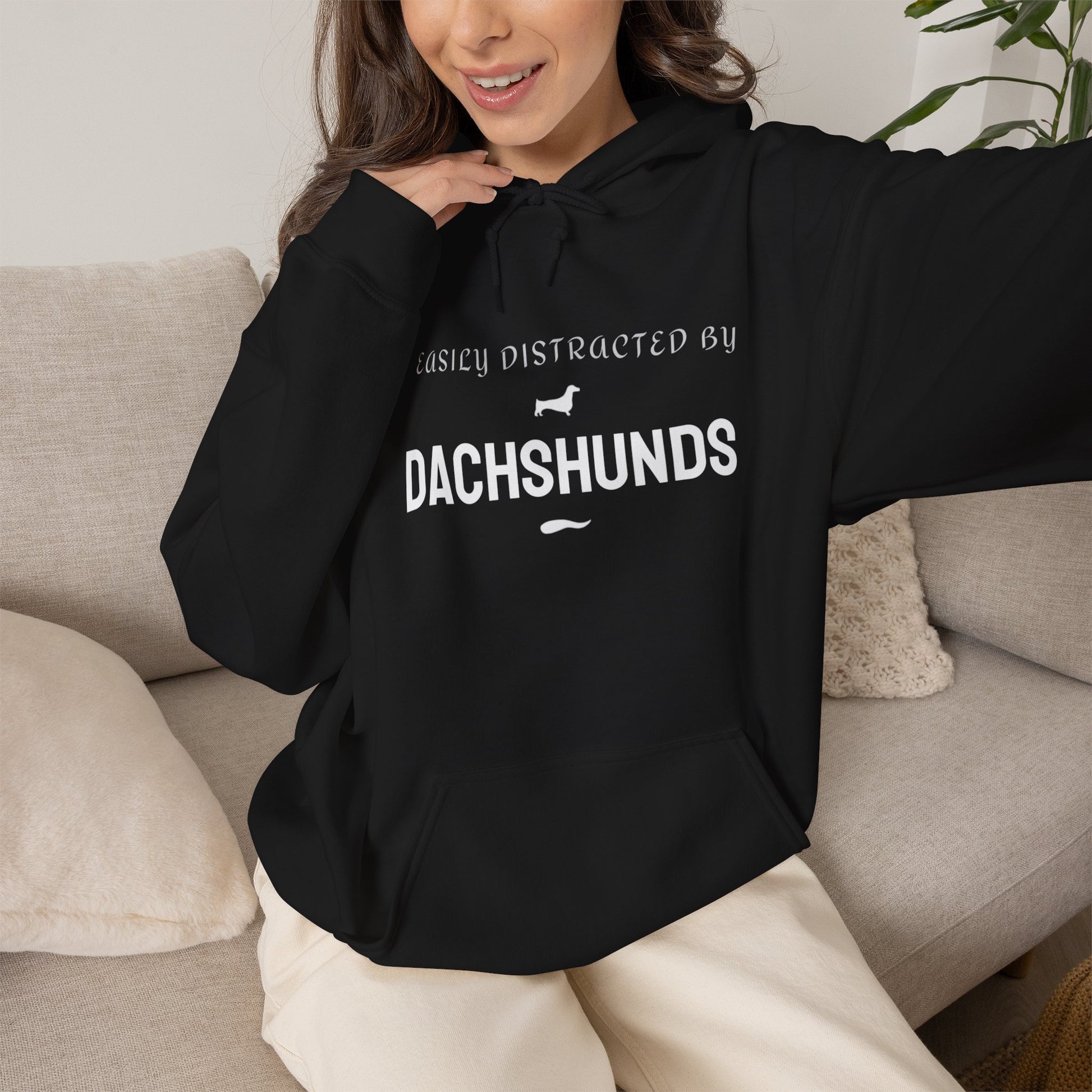 Unisex dachshund hoodie shown on model, funny dog lover gift