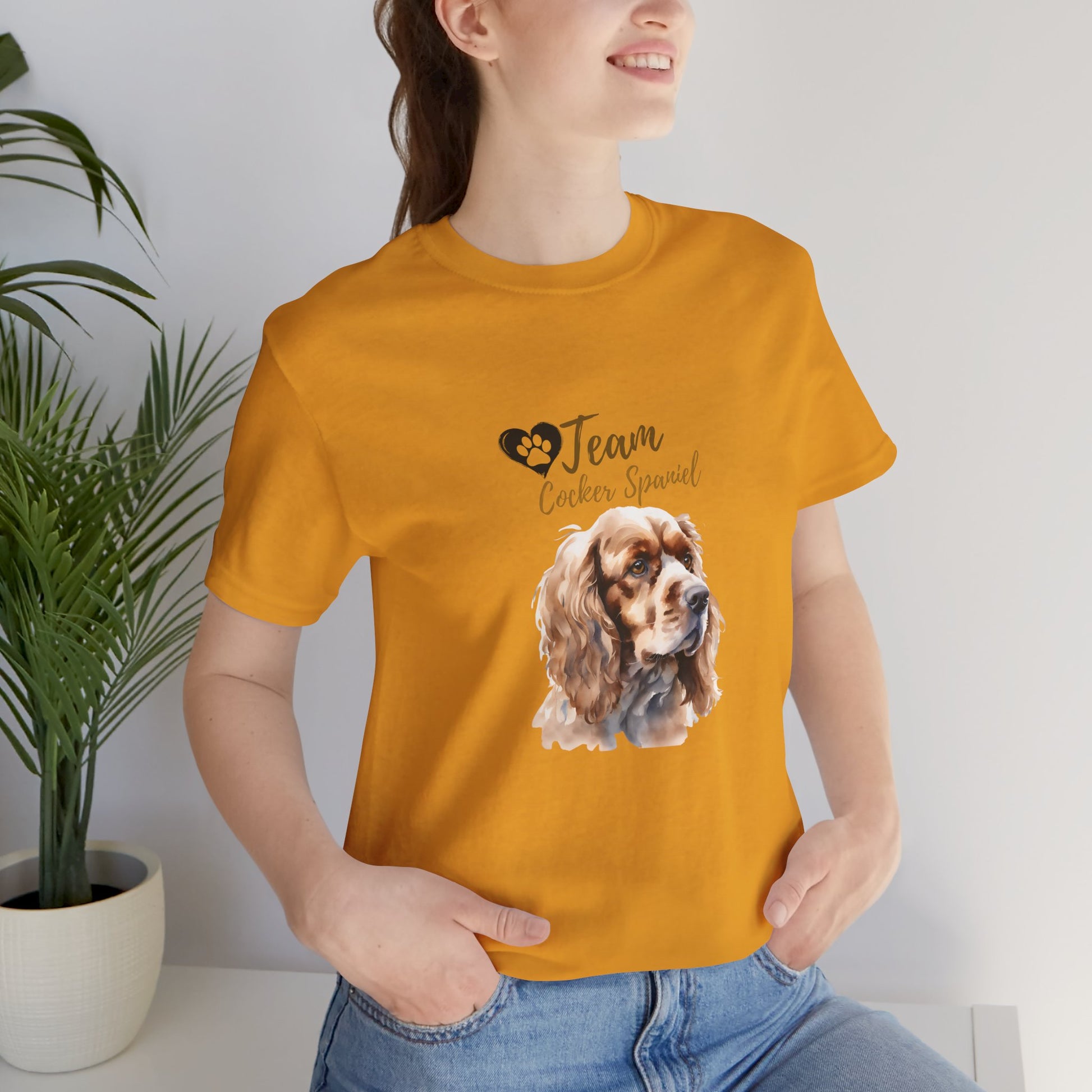 Team Cocker Spaniel watercolour t-shirt in Mustard worn by a model, front view