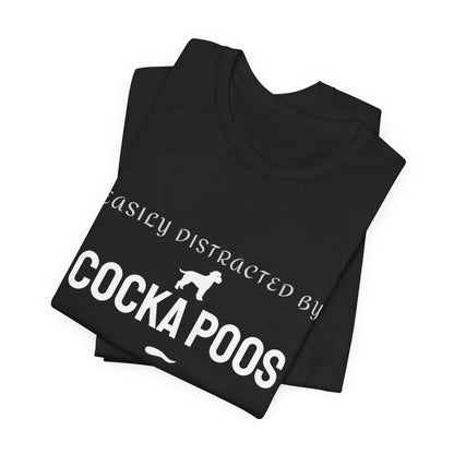 Cockapoo owner wearing a black Easily Distracted by Cockapoos funny dog t-shirt