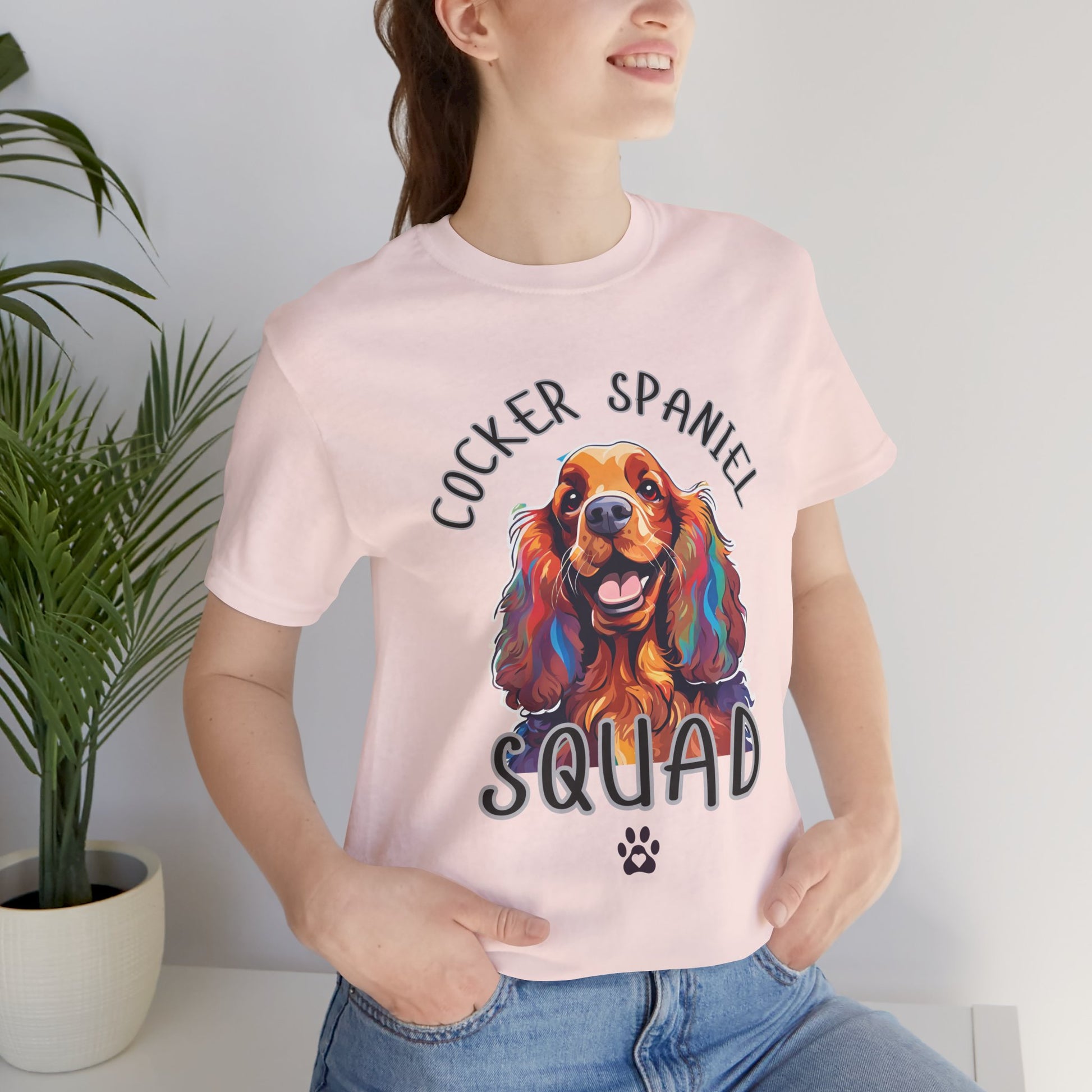 Cocker Spaniel Squad pop-art t-shirt in Soft Pink worn by a model, front view
