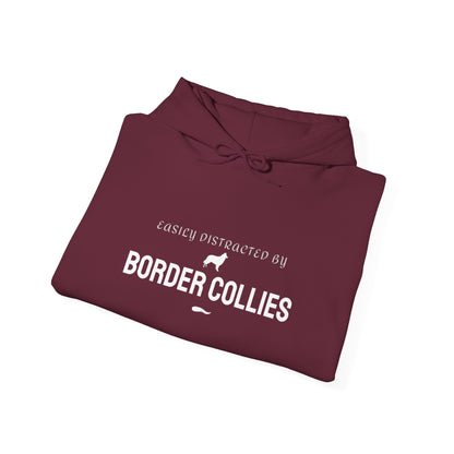Easily Distracted by Border Collies hoodie black flat lay