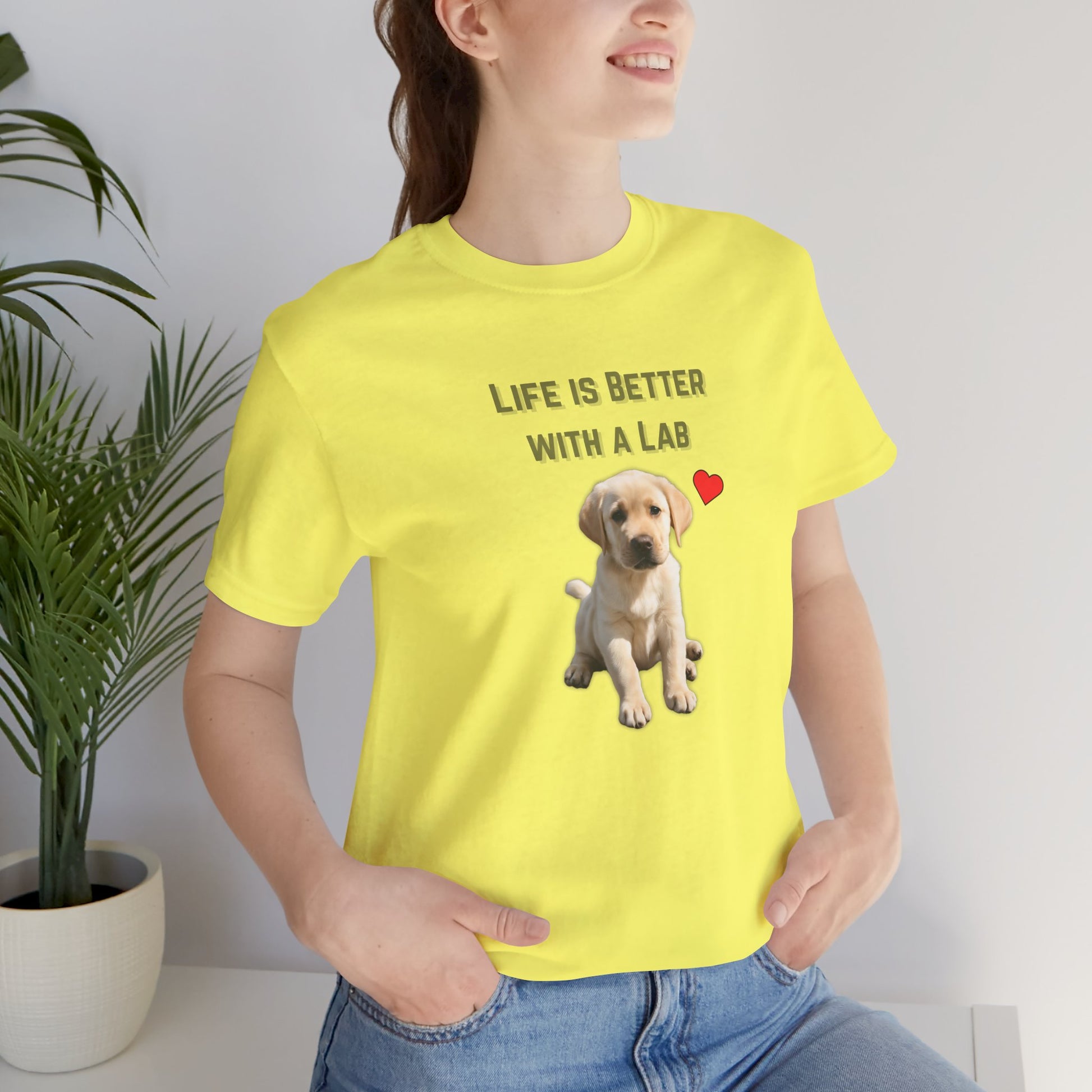Life Is Better with a Lab puppy t-shirt in Yellow worn by a model, front view