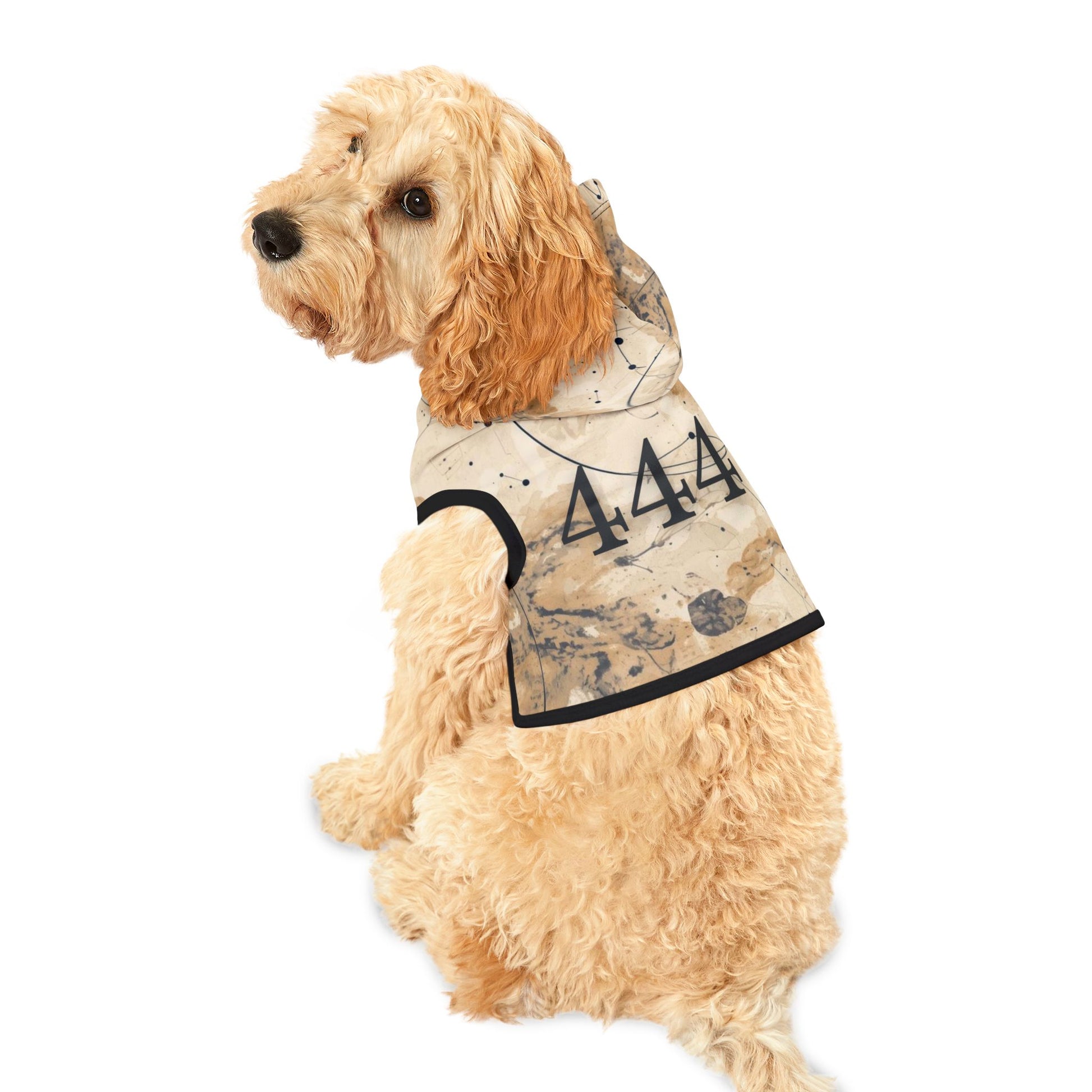 Dog wearing 444 guardian heirloom hoodie with earthy marbled pattern