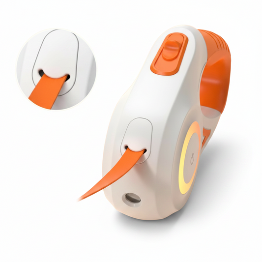 Three LumiLead™ retractable LED dog leads in green, orange and purple — LED rings glowing and flashlights on