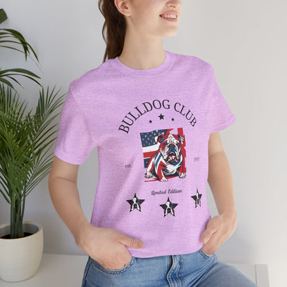 Woman wearing Heather Prism Lilac Bulldog Club t-shirt with flag bulldog design