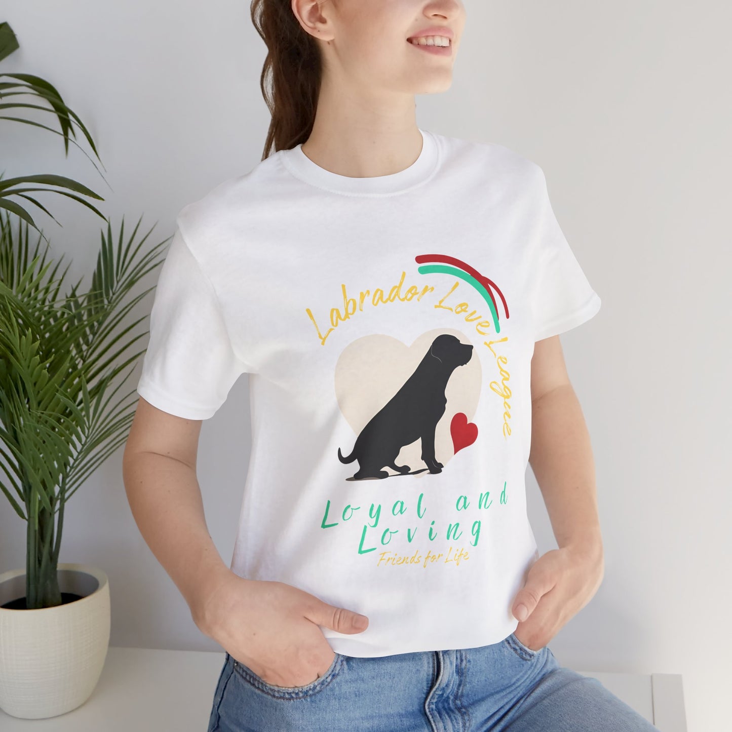 Woman wearing White Labrador Love League t-shirt with black Lab heart design