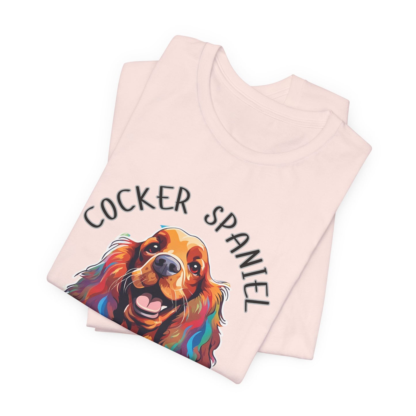 Cocker Spaniel Squad pop-art t-shirt in Soft Pink, folded view showing print