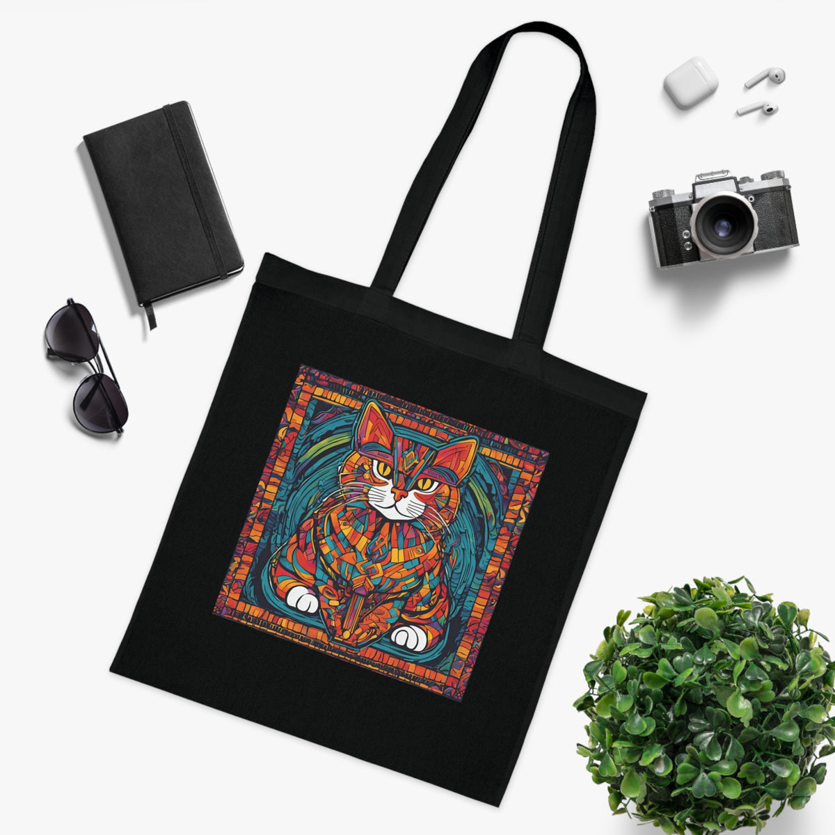 Cat tote bag black colourway — stained glass cat artwork glowing on dark cotton, 42x38cm