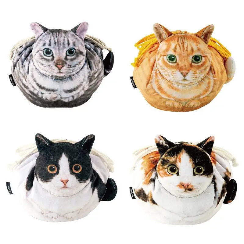 Four cat face plush pouches flat lay — tuxedo, calico, ginger tabby and grey tabby on white background