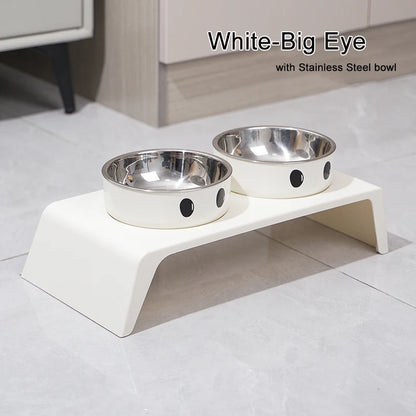 White pet feeding station with two stainless steel bowls on a light gray floor.