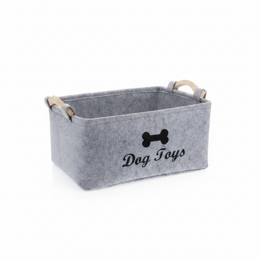 Grey felt dog toy storage box with wooden carry handles and black bone graphic on the front panel