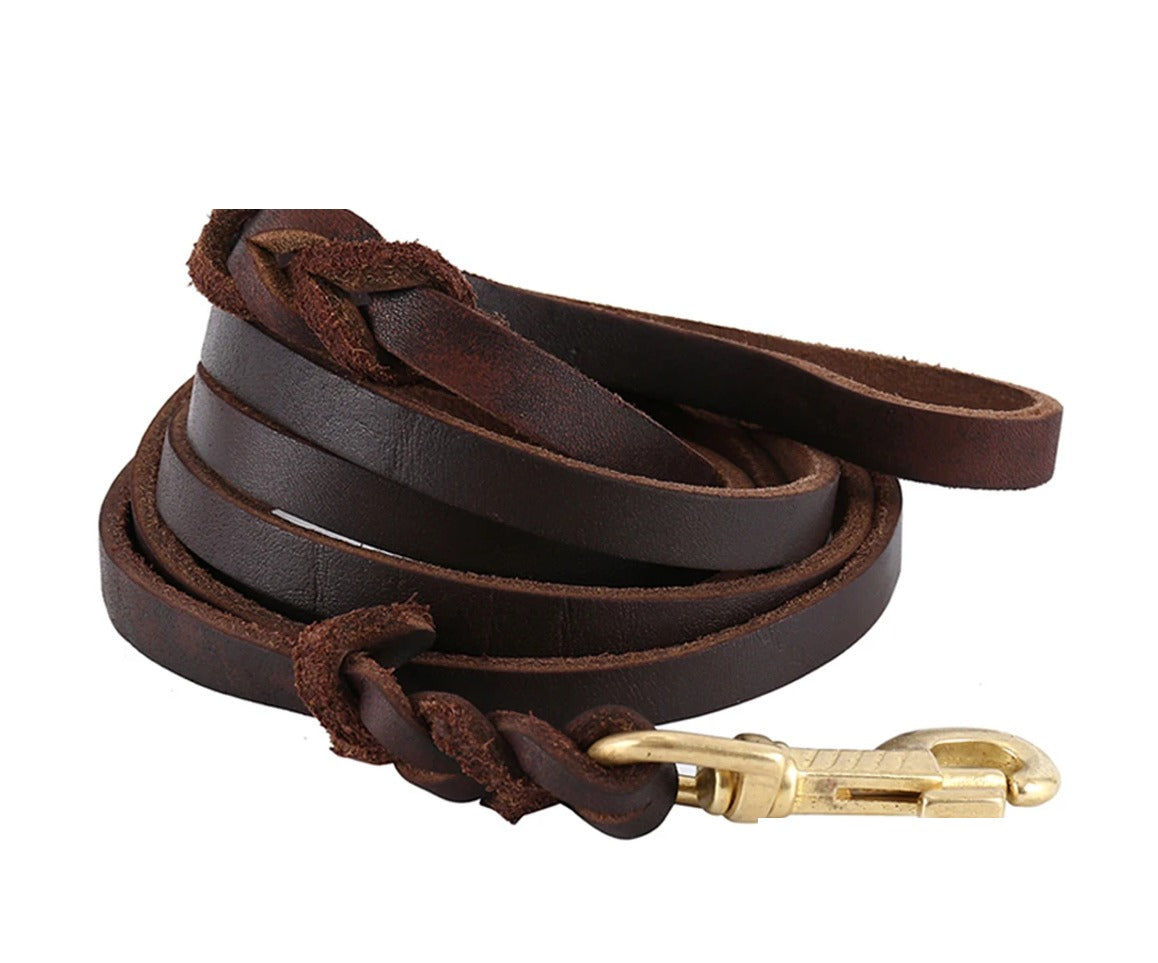 Close-up of hand-braided accents and stitched handle loop on the IronPaw Heritage 5mm cowhide leather dog lead.