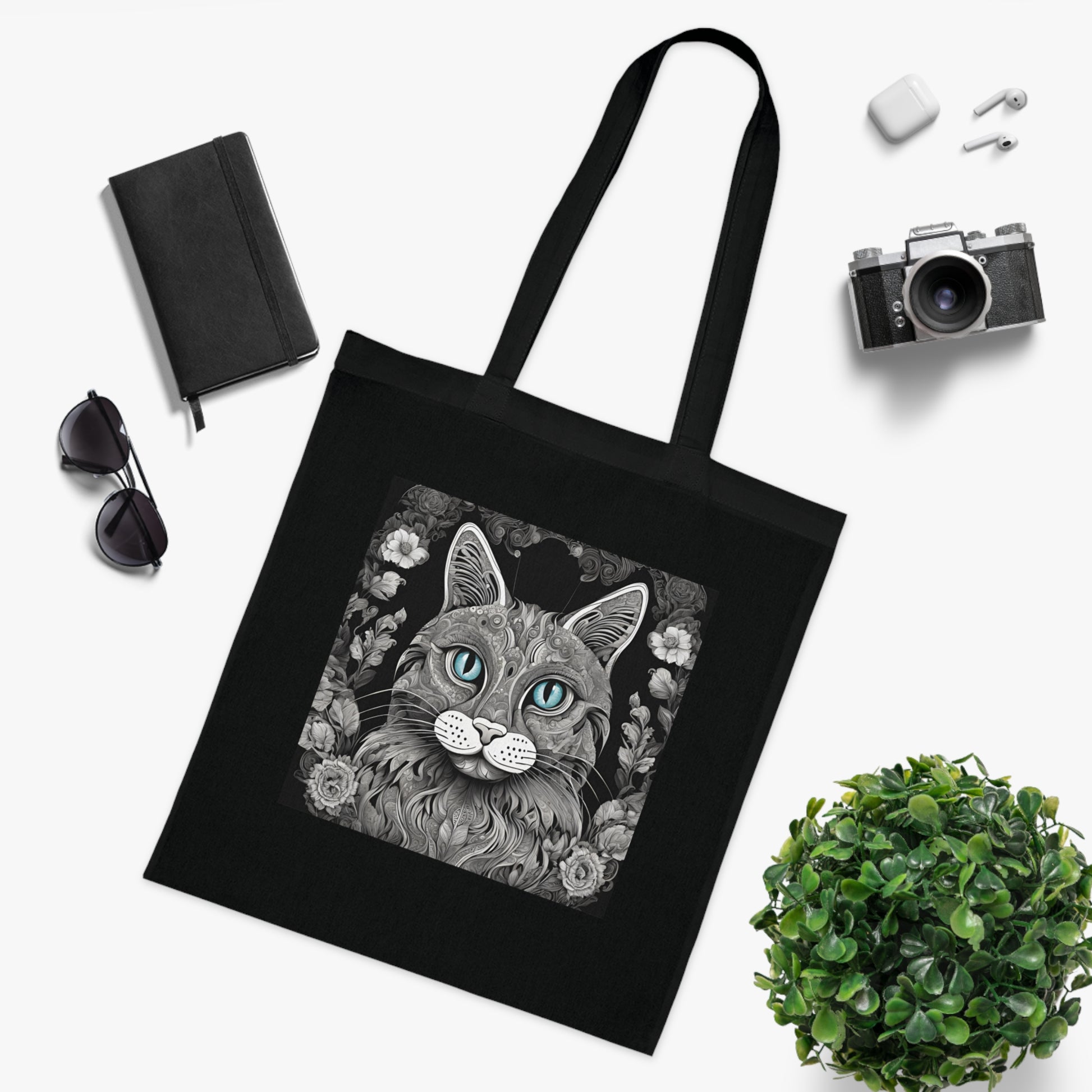 PawInk™ mandala cat cotton tote bag in black — monochrome cat face illustration with teal eyes, printed cotton, 42×38 cm
