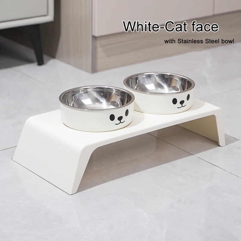 White pet feeding station with two stainless steel bowls on a tiled floor.