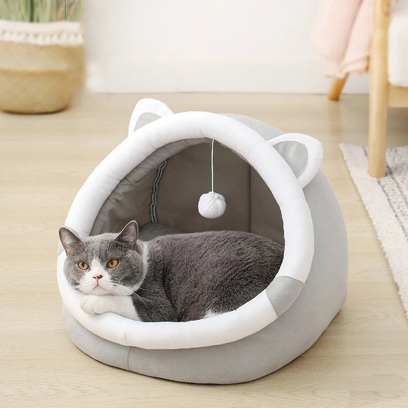 PawDome cat cave bed side profile — removable cushion base and sculpted cat ear roof detail