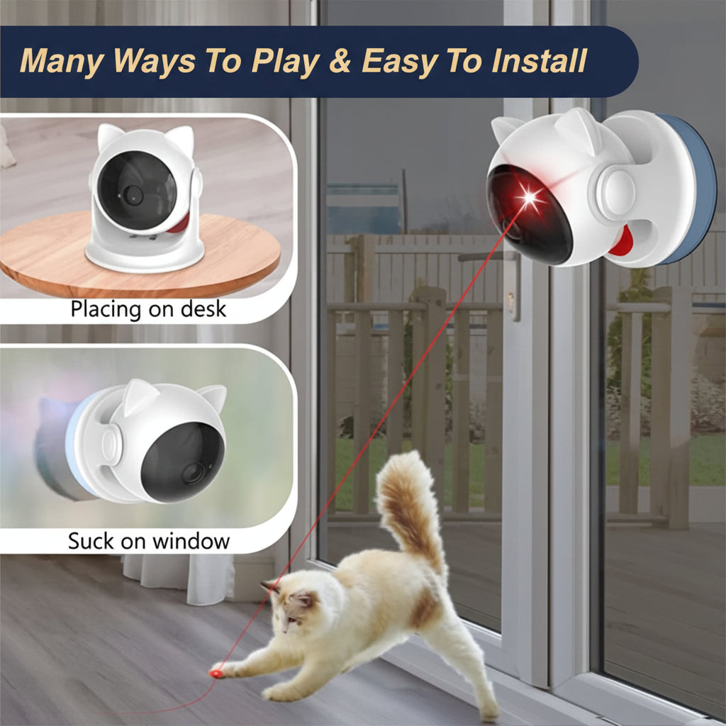 White cat-face shaped automatic laser toy on round pedestal desk stand, red laser beam visible