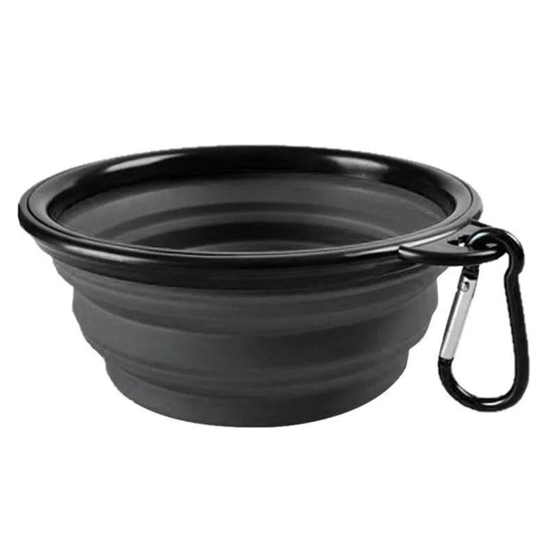 Black PawTrek foldable silicone dog travel bowl with integrated carabiner clip