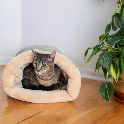 Semi-enclosed cat cave showing warm cushioned interior