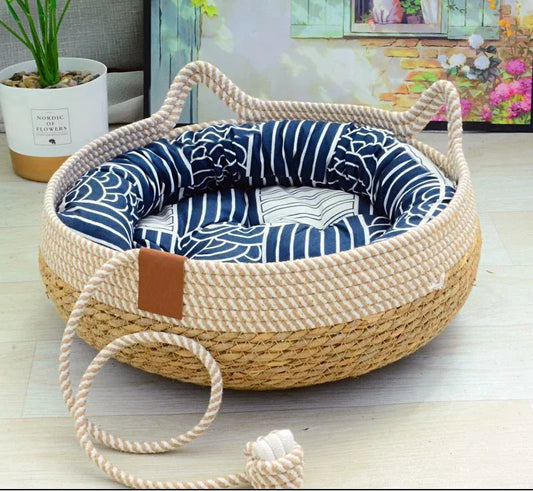 PawNest woven natural rope cat basket bed with cat-ear rim and blue patterned cotton cushion