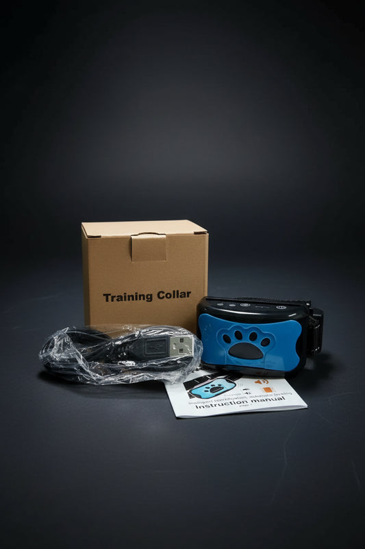 SniffWaggleNWalk HushPup™ anti-bark training collar in red on grass — side view showing USB charging port and voice sensor