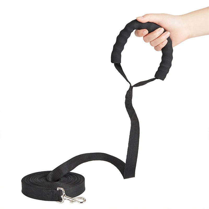 SniffWaggleNWalk LongLine™ 10m training lead — black nylon tape coiled with padded sponge loop handle and stainless bolt-snap clip