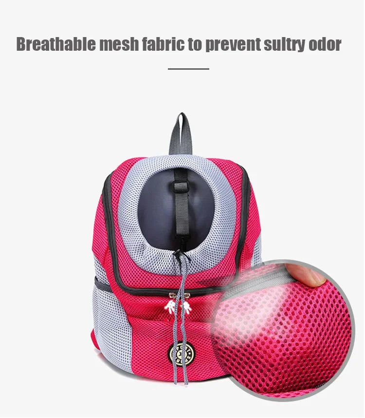 Red and gray pet carrier with breathable mesh fabric feature on a white background