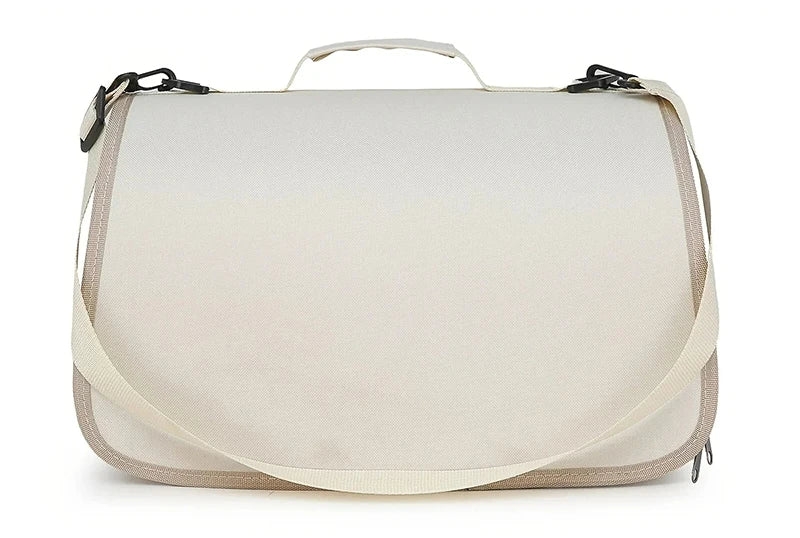 Back view of SnuggleGo™ white pet carrier showing luggage sleeve strap