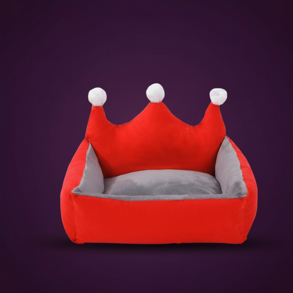 Crown-shaped dog bed in red — side view showing upright padded crown points and plush lining