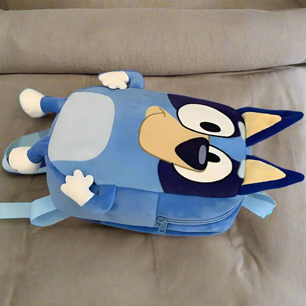 Blue dog school bag for nursery and primary school children — lifestyle shot