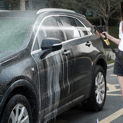 car getting washed by lenghtyhose